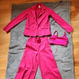 Pink Dance suit, bell bottomish, crop top and jacket. Stretch material.